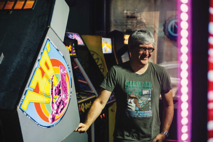 Dandrea standing next to the 720° game—created by Atari.